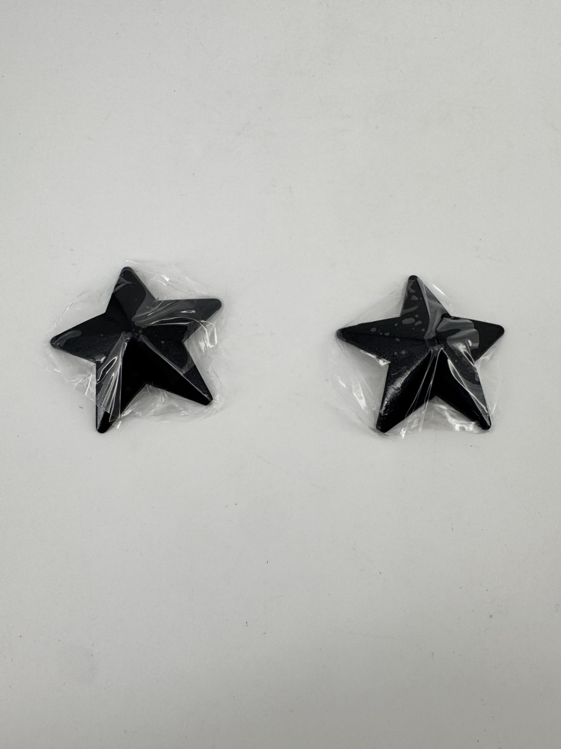 Caches tétons étoiles métal noire - Spazm Accessoires