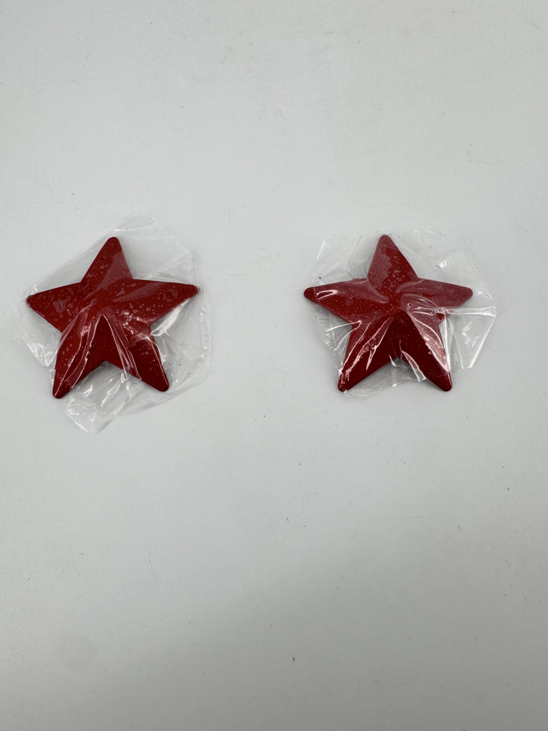 Caches tétons étoiles métal rouge - Spazm Accessoires