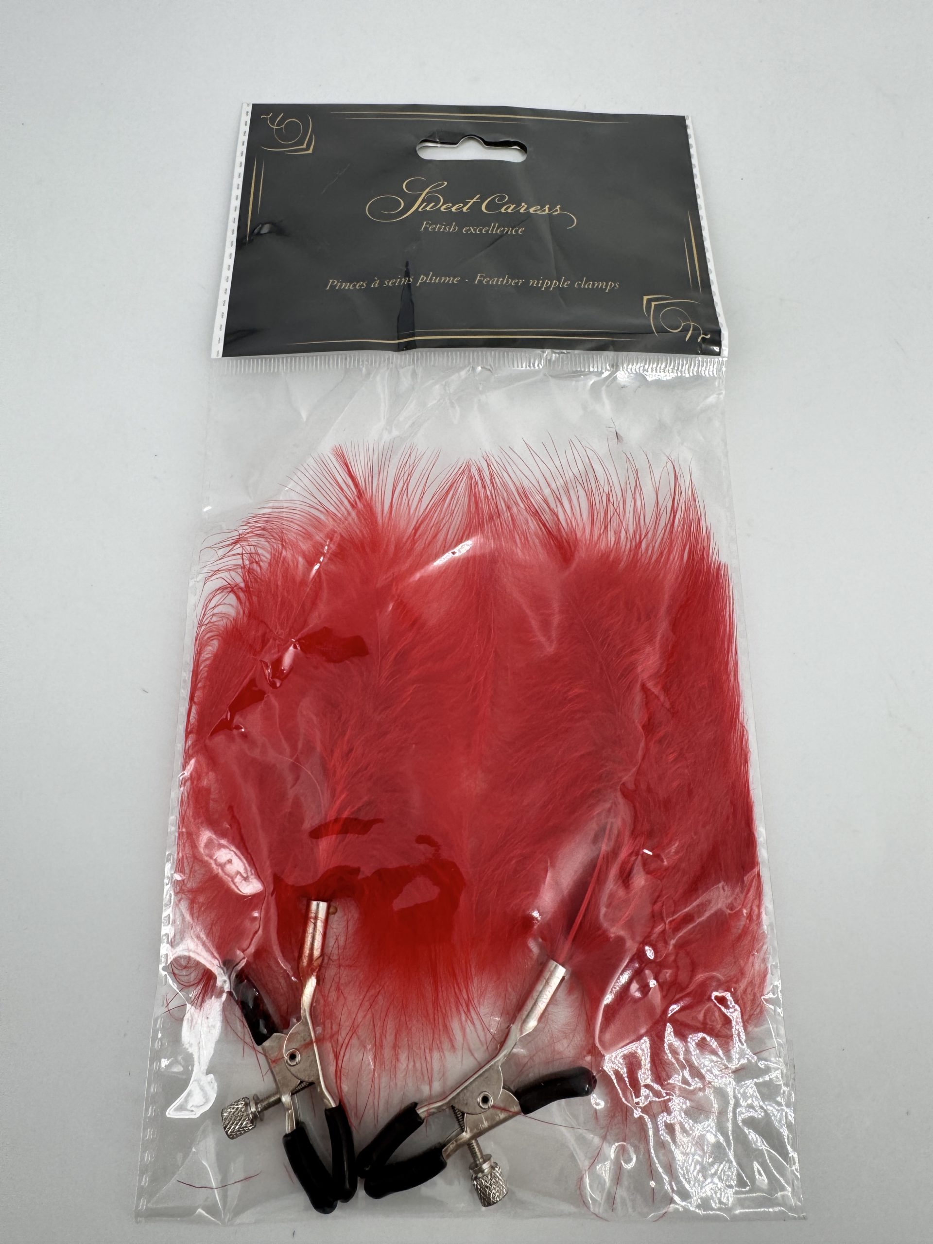 Pinces à seins pression réglable grande plumeau rouge Sweet Caress