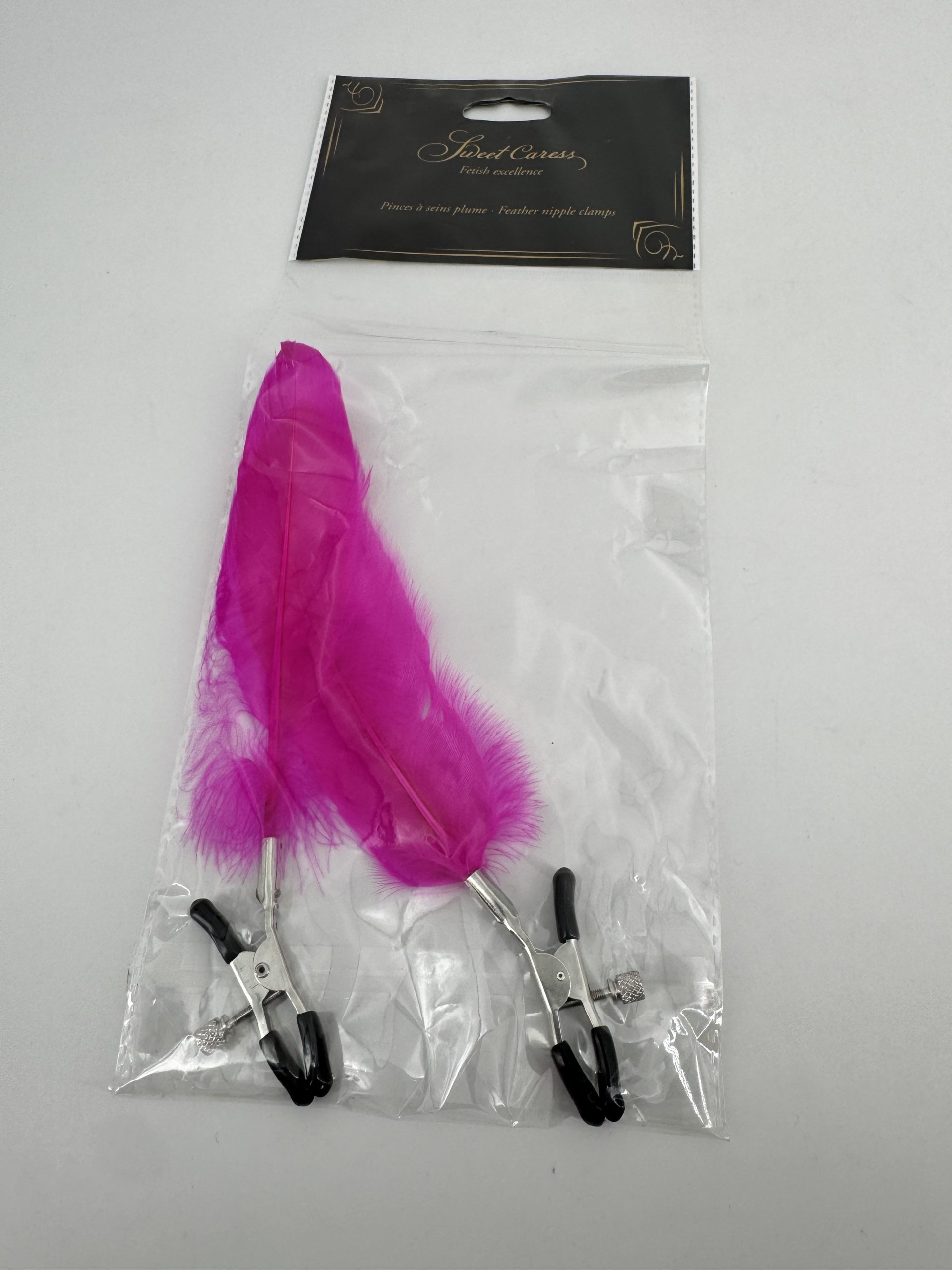 Pinces à seins pression réglable plume violet Sweet Caress